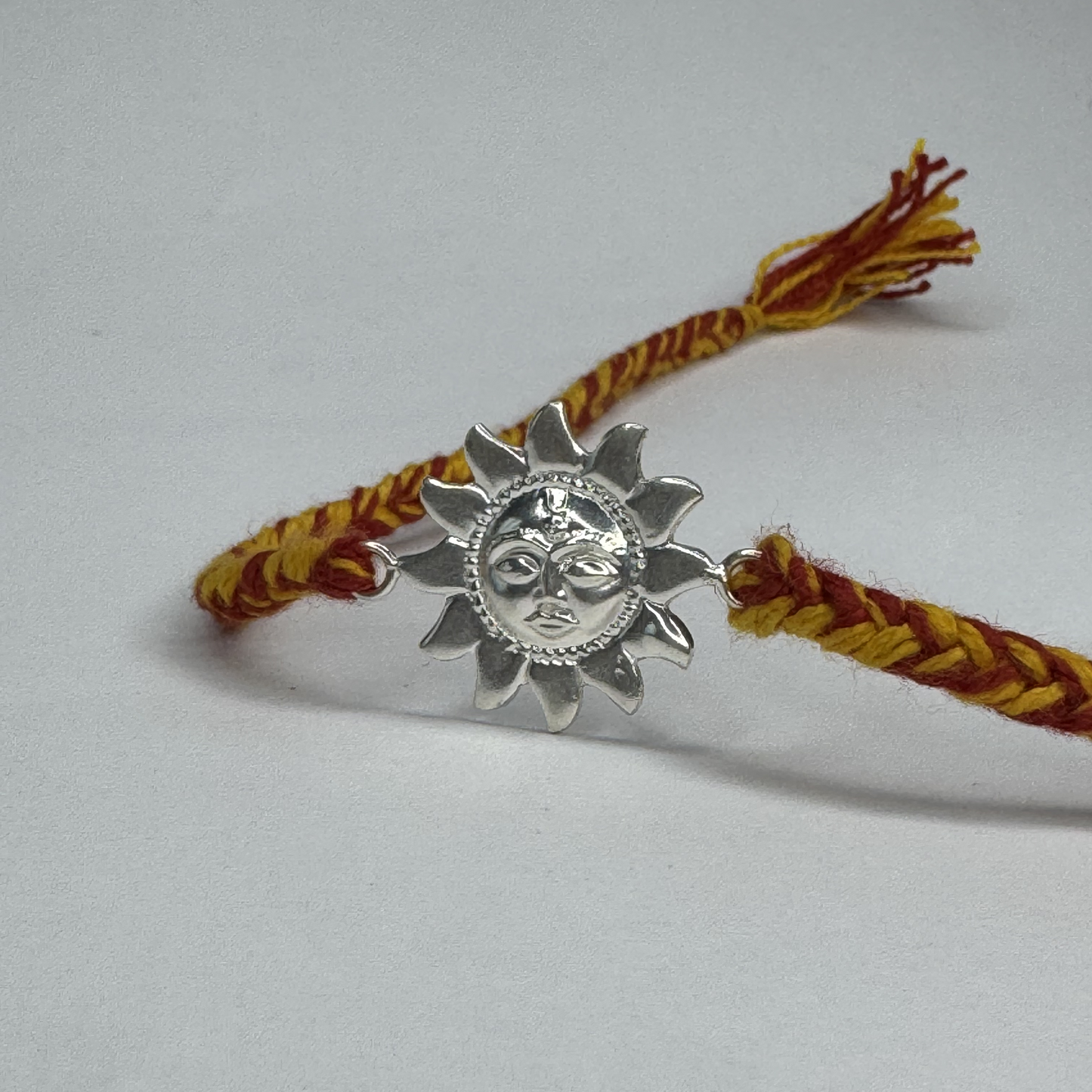 Sun Motif Silver Rakhi