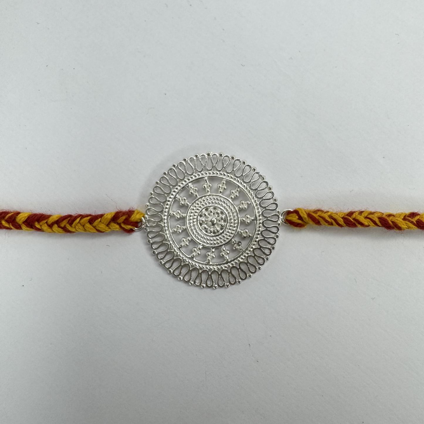 Chandrika Round Silver Rakhi
