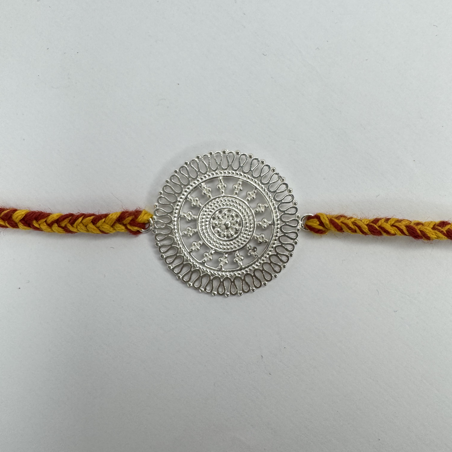 Chandrika Round Silver Rakhi