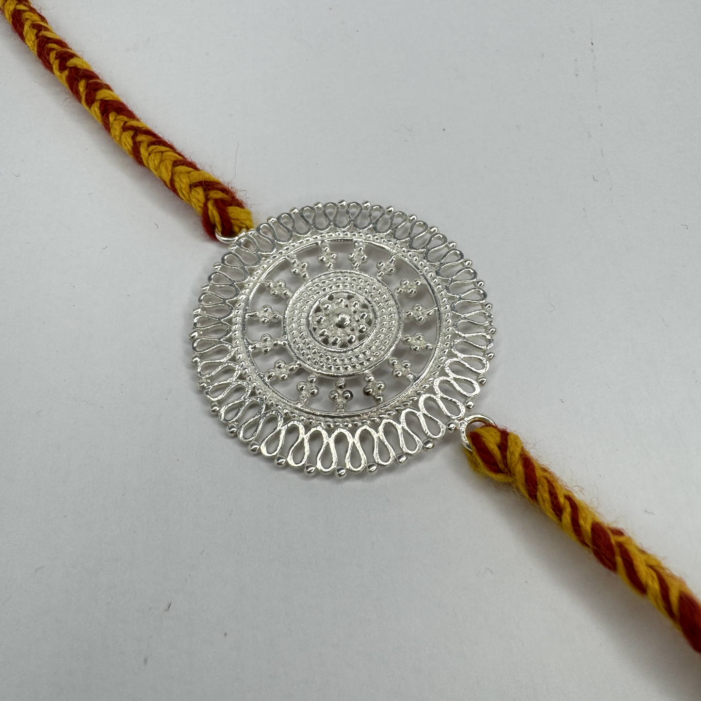 Chandrika Round Silver Rakhi