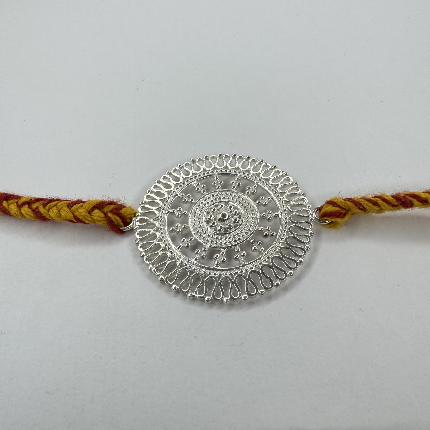 Chandrika Round Silver Rakhi