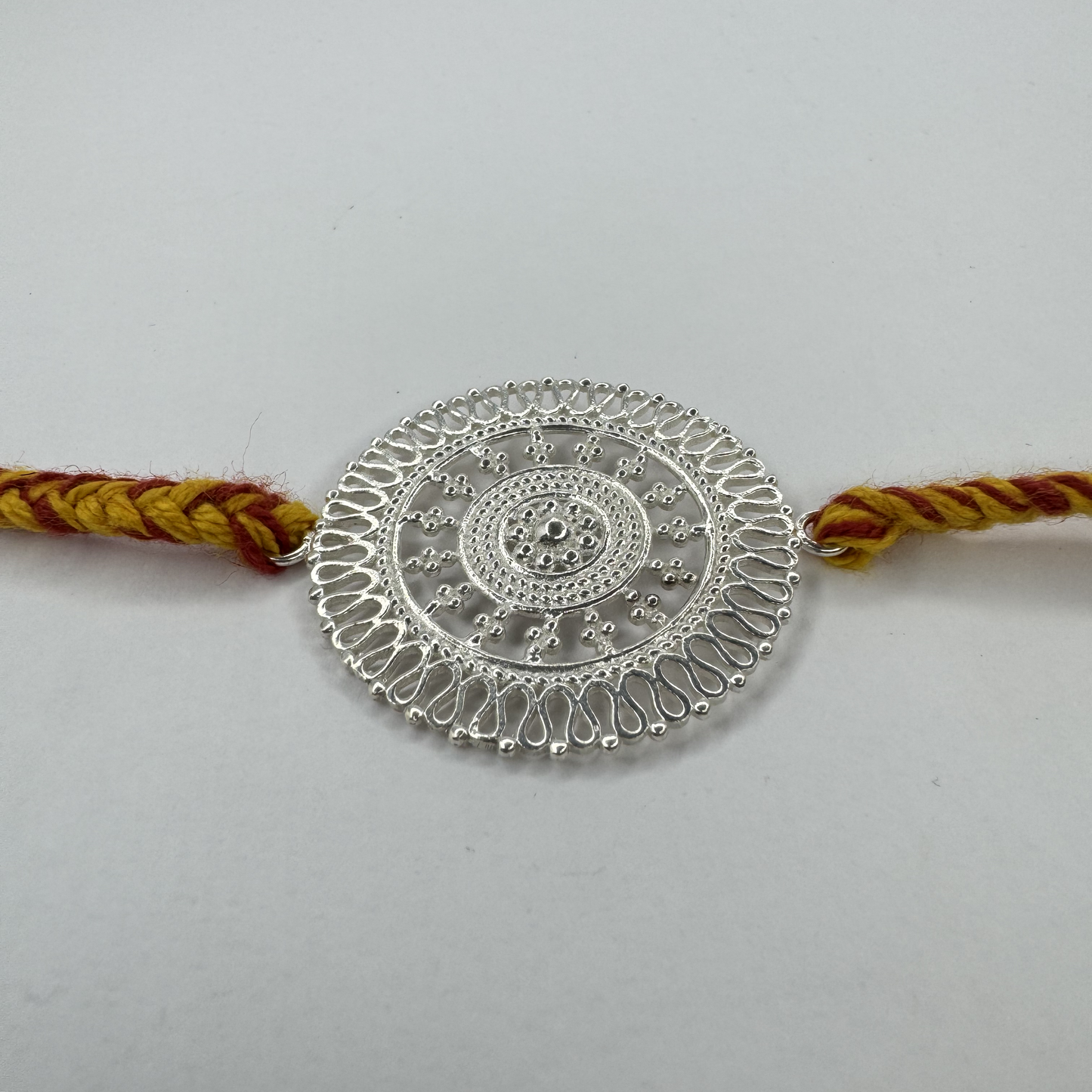Chandrika Round Silver Rakhi