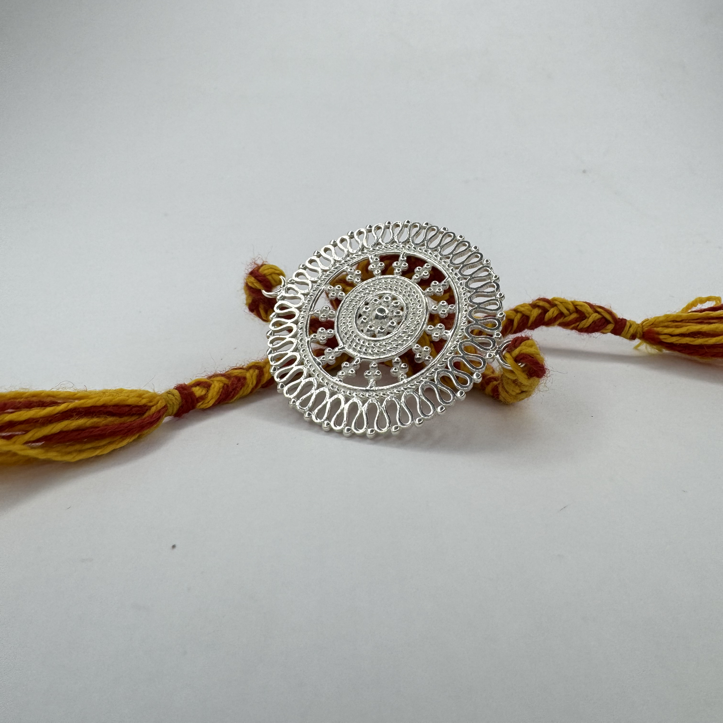 Chandrika Round Silver Rakhi
