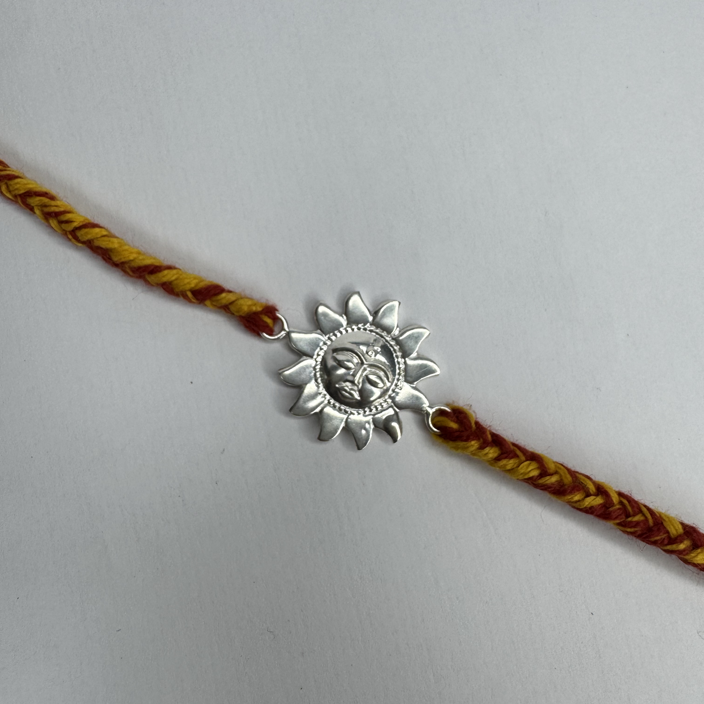 Sun Motif Silver Rakhi