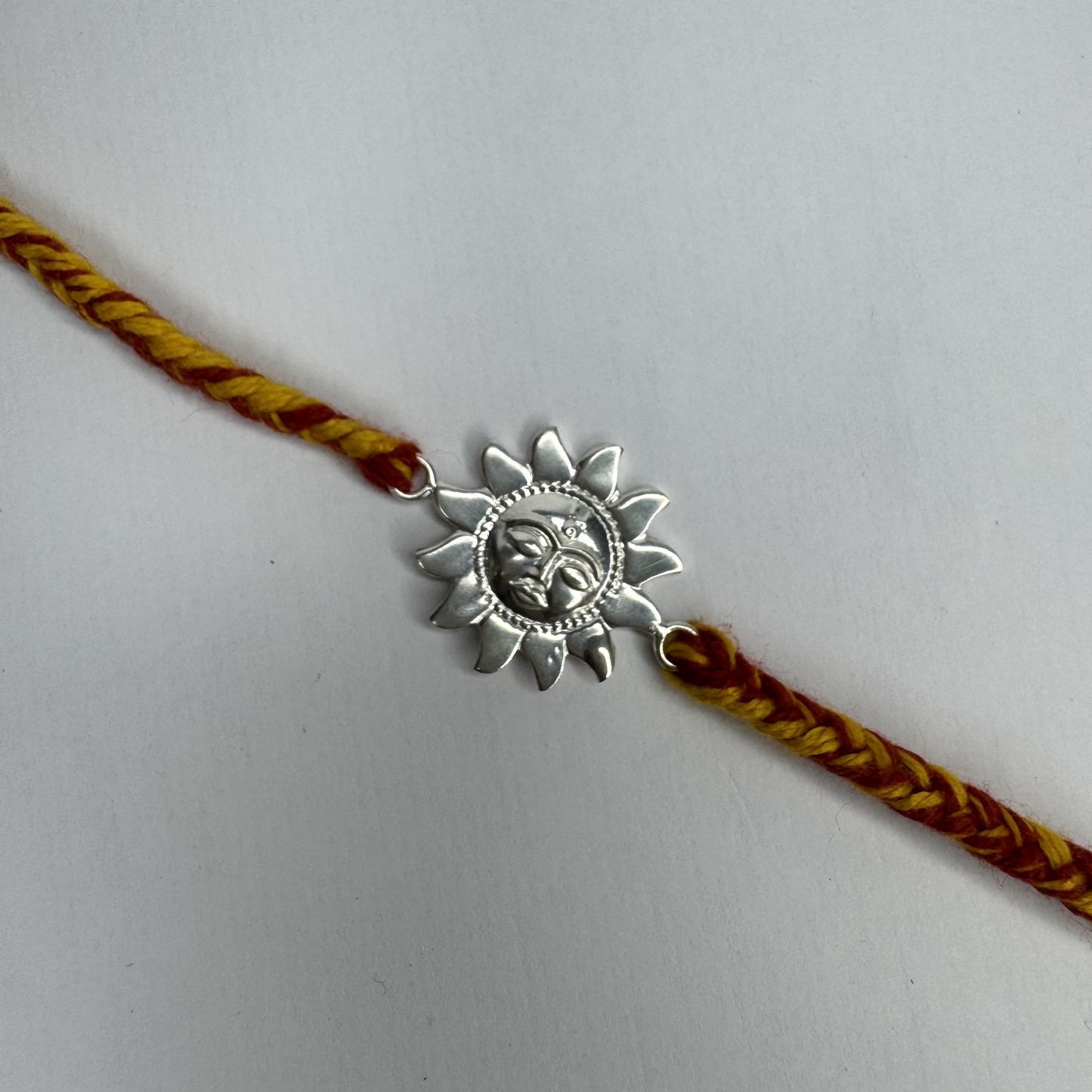 Sun Motif Silver Rakhi