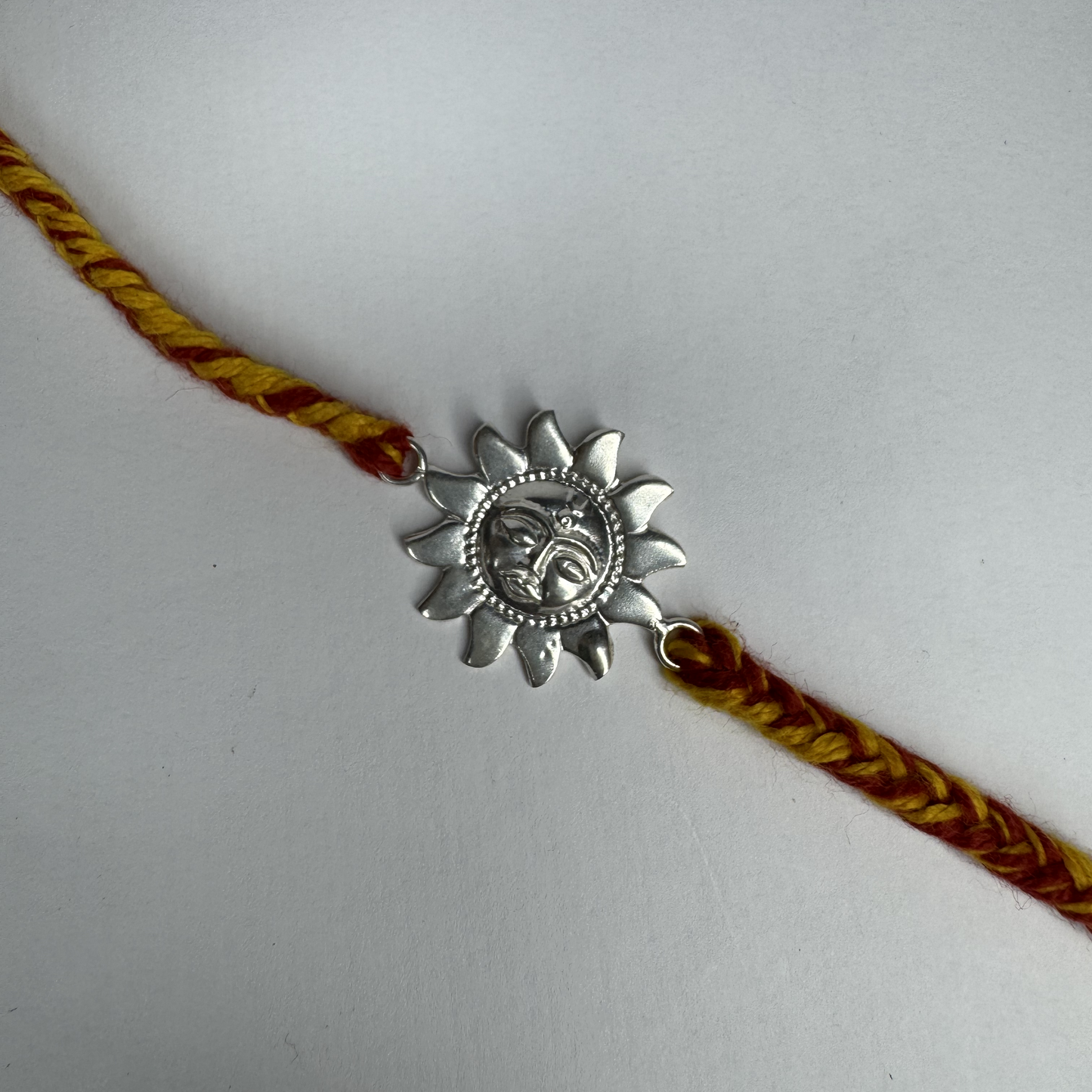 Sun Motif Silver Rakhi