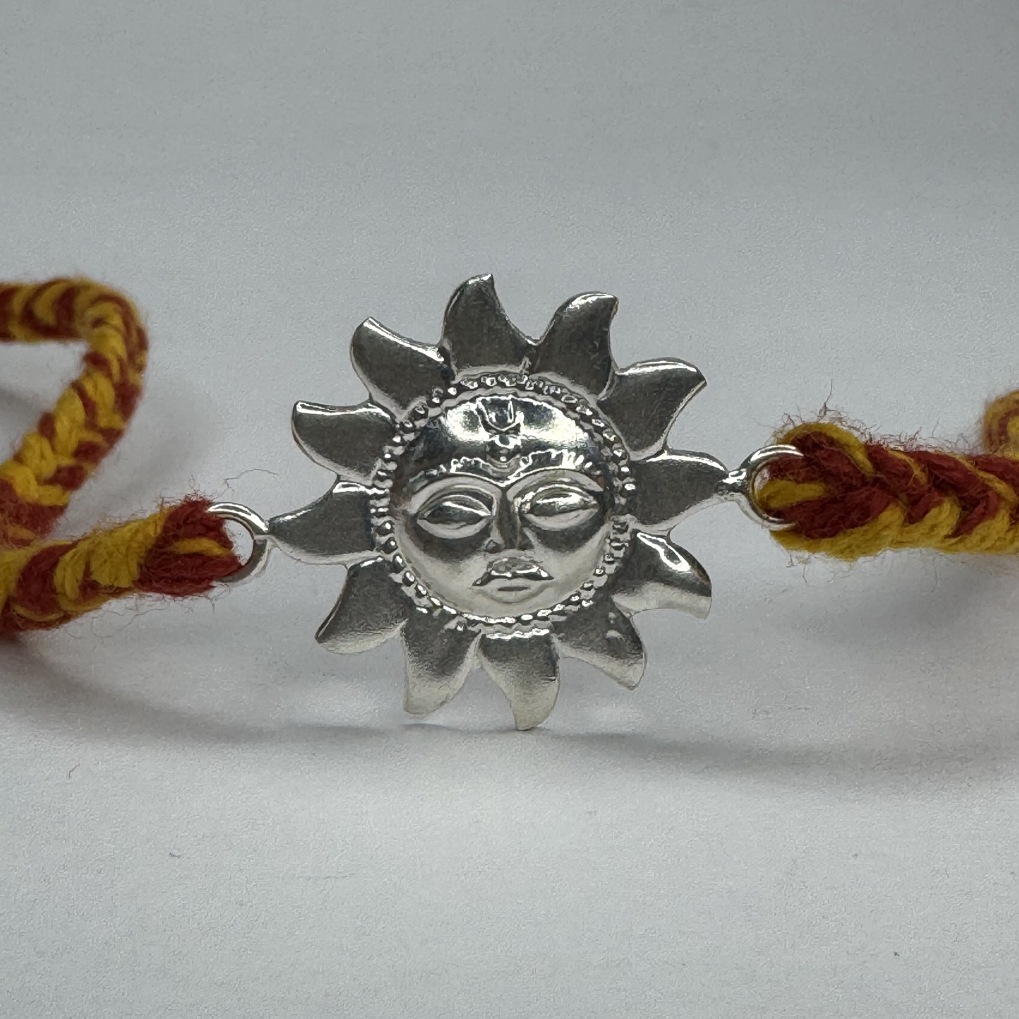 Sun Motif Silver Rakhi